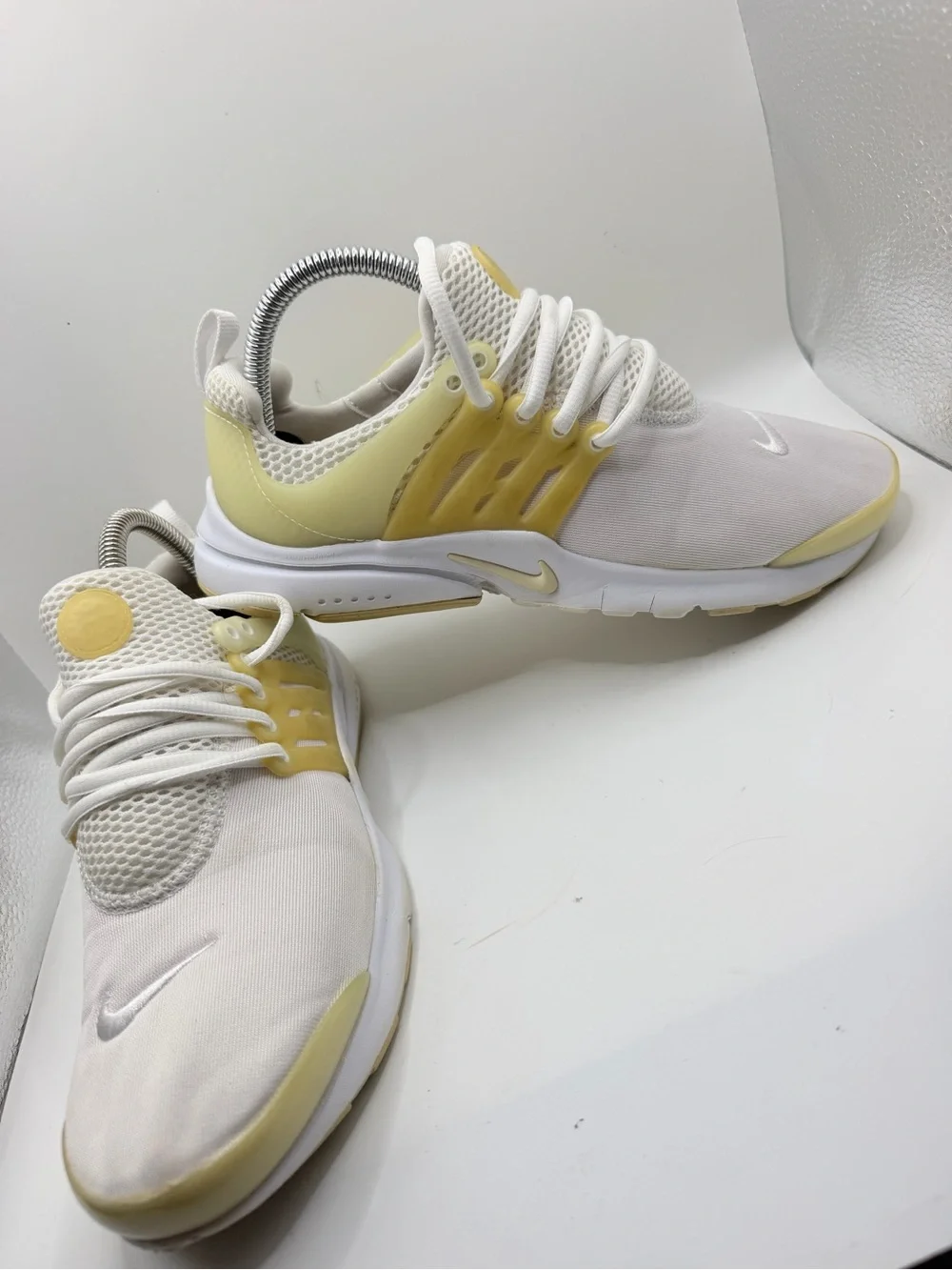 Nike Women's Pale Yellow and White Slip-On Athletic Sneakers